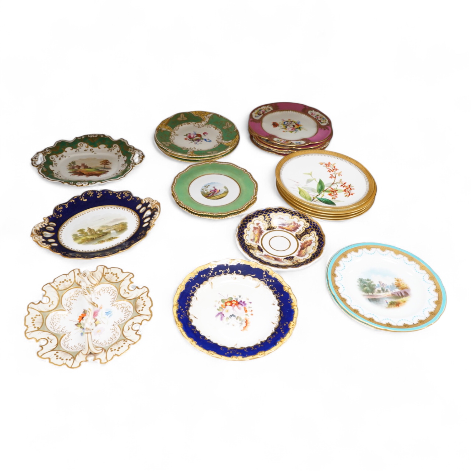 A collection of 19th century English dessert wares to include a pair of Flight, Barr and Barr ‘fantastic birds’ green ground dessert plates, various Ridgway dessert plates, five Minton botanical plates with tooled gilt b
